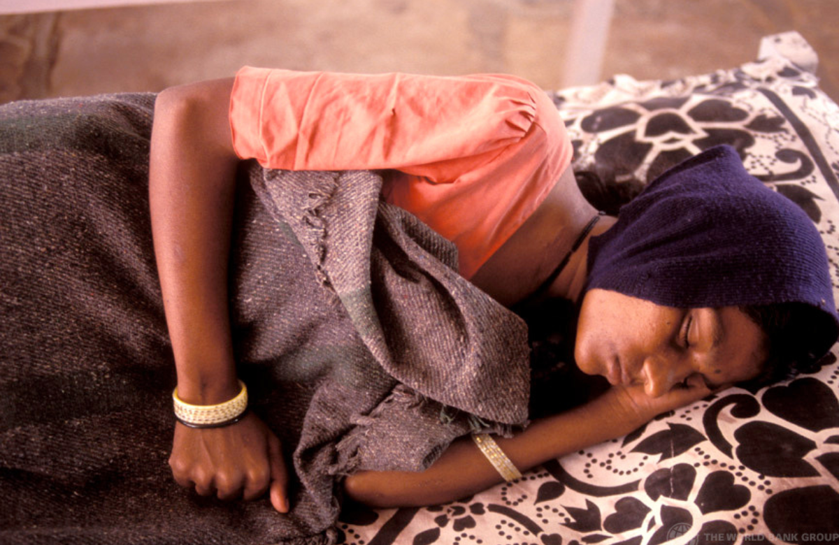 HIV-positive woman being cared for in hospital, India. Photo by John Isaac / World Bank. Creative Commons licence.