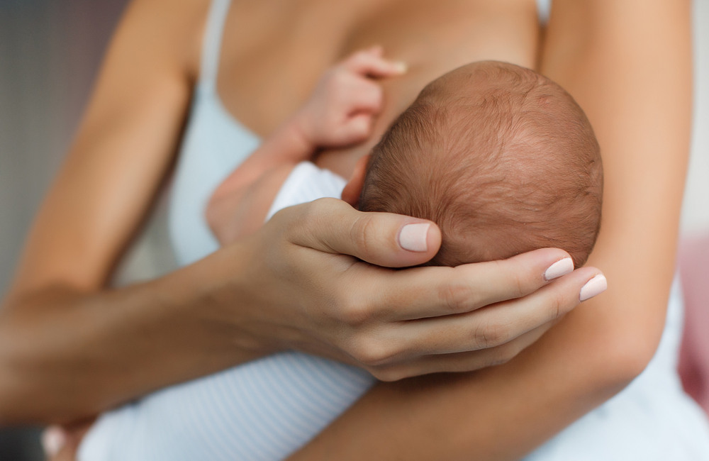 How To Stop Breastfeeding While Keeping Yourself & Baby Happy - Motherly